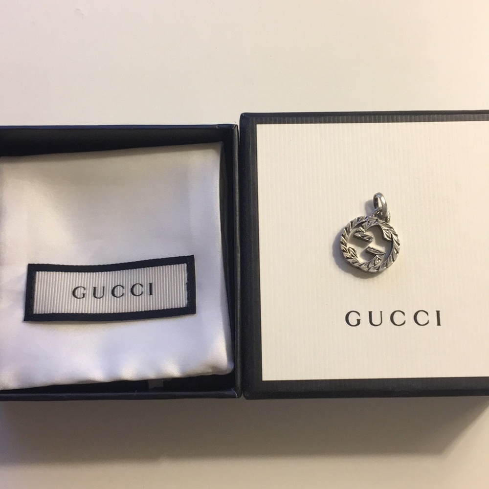 Authentic Gucci double lock GG charm